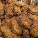Tub of fried chicken wings prepared for wing eating contest
